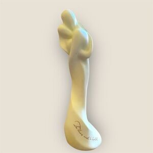 White porcelain man/woman hugging